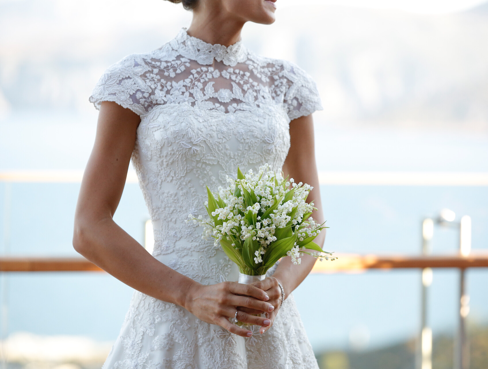 Phillipa Lepley Bride Wearing Strapless Corseted Wedding Dress With Removable Embroidered Top