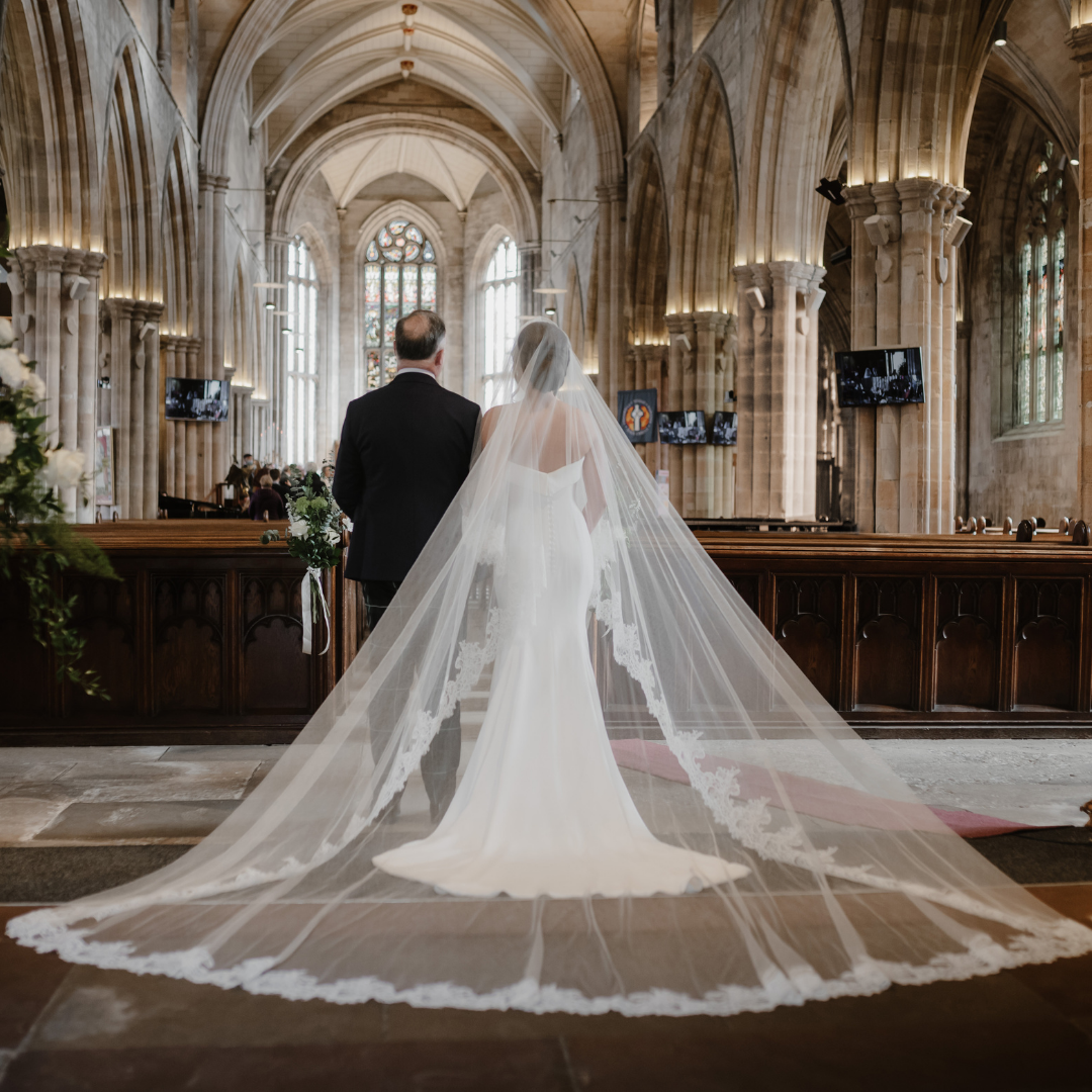 Phillipa_Lepley_Bride_Meghan_Strapless_Silk_Crepe_Gown_Origami_Folded_Neckline_Lace_Edged_Veil_1