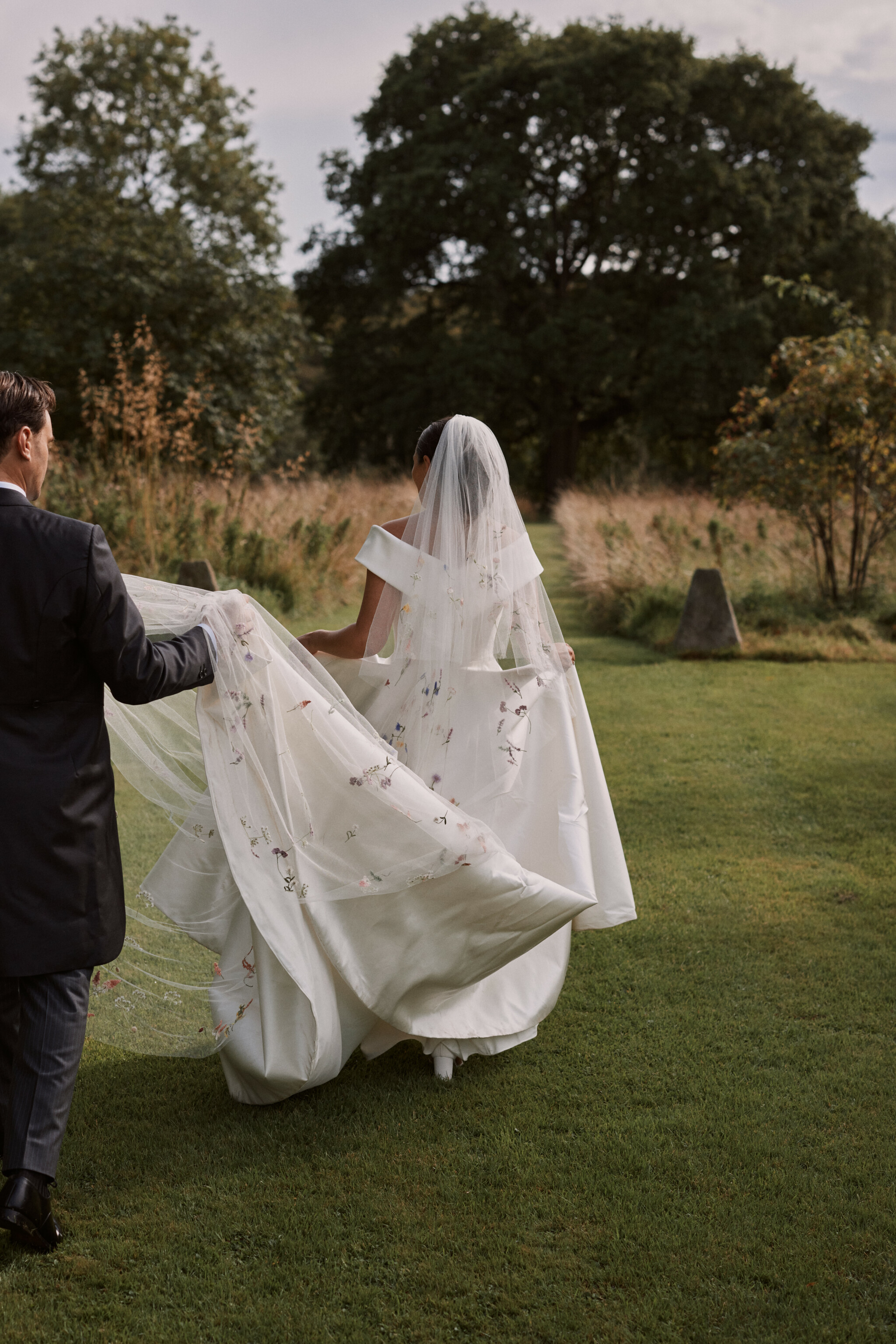 Phillipa_Lepley_Bride_Harriet_Duchess_Satin_Off_The_Shoulder_Wedding_Dress_Colourful_Hand_Embroidered_Wildflower_Meadow_Veil
