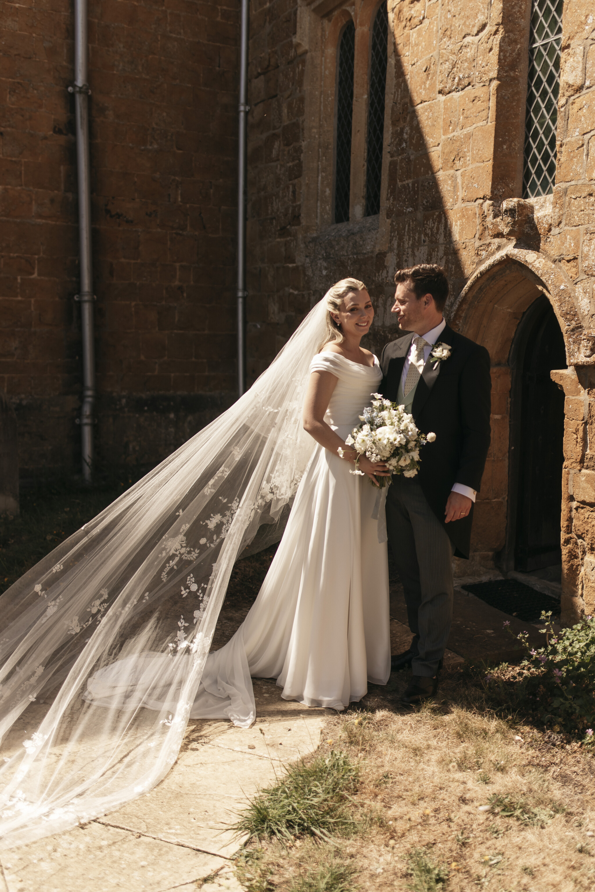 Phillipa_Lepley_Bride_Flo_English_Country_Wedding_Draped_Off_The_Shoulder_Corseted_Wedding_Dress_Embroidered_Veil