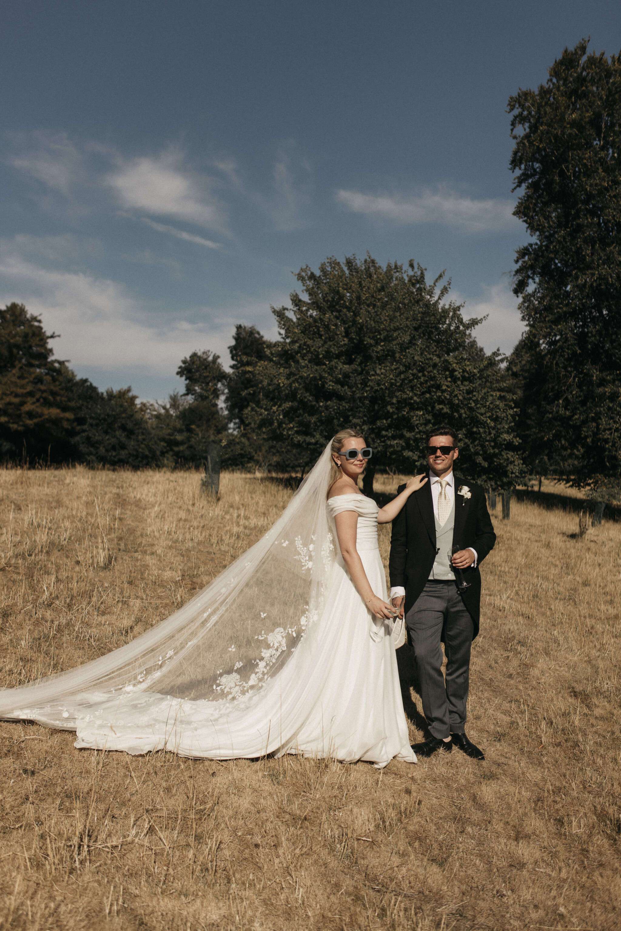 Phillipa_Lepley_Bride_Flo_English_Country_Wedding_Draped_Off_The_Shoulder_Corseted_Wedding_Dress_Embroidered_Veil