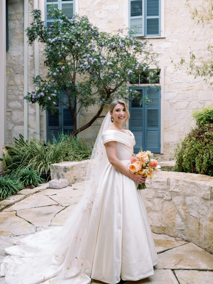 Phillipa Lepley bride Catherine Couture Duchess Satin Off the Shoulder Wedding Dress Texas Wedding Colorful Embroidered Flower Veil
